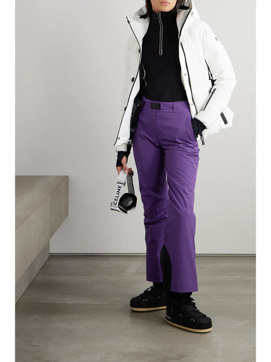 Image of a model wearing Pants. Product name - Buckled Bootcut Ski Pants in Purple colour by brand - Moncler Grenoble