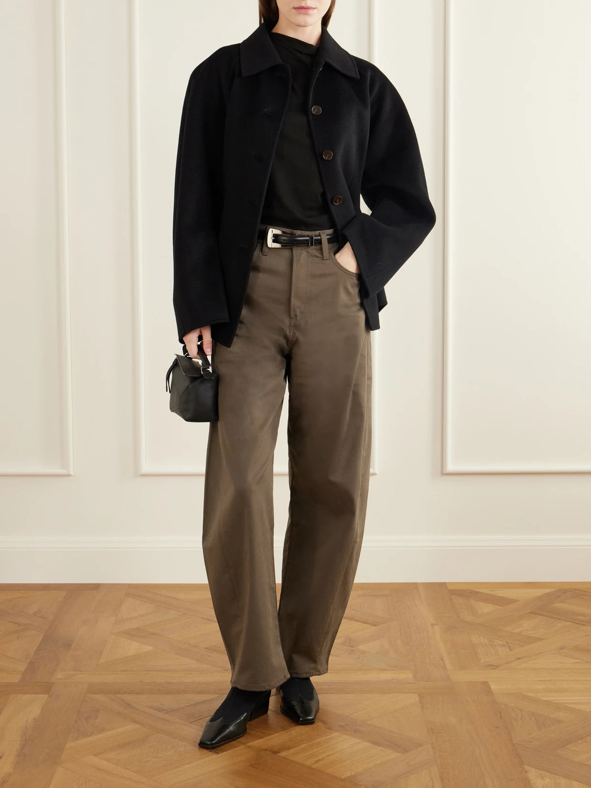 Image of a model wearing Pants. Product name - Luna Cotton-twill Barrel-leg Pants in Taupe colour by brand - AGOLDE
