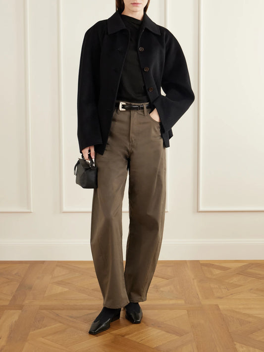 Image of a model wearing Pants. Product name - Luna Cotton-twill Barrel-leg Pants in Taupe colour by brand - AGOLDE