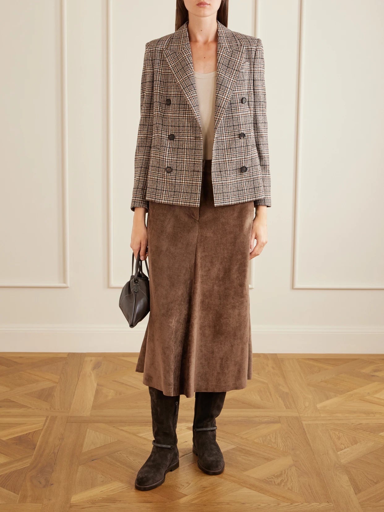Image of a model wearing Skirts. Product name - Embellished Corduroy Midi Skirt in Dark brown colour by brand - Brunello Cucinelli