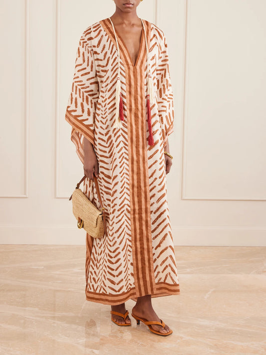 Image of Dresses. Product name - The Secret Of The Sun Printed Cotton Kaftan in Brown colour by brand - Johanna Ortiz