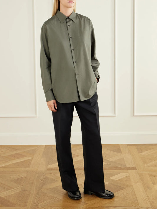 Image of a model wearing Pants. Product name - Wool And Cotton-blend Straight-leg Pants in Black colour by brand - Auralee