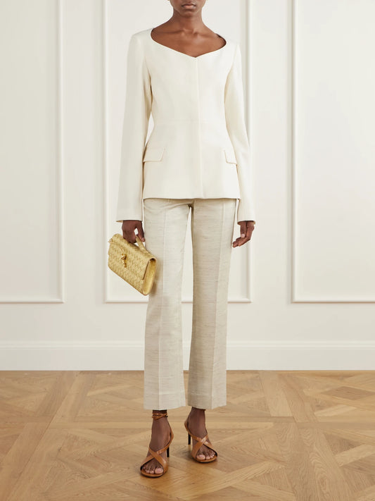 Image of a model wearing Pants. Product name - Lilian Twill Straight-leg Pants in Sand colour by brand - LIBEROWE