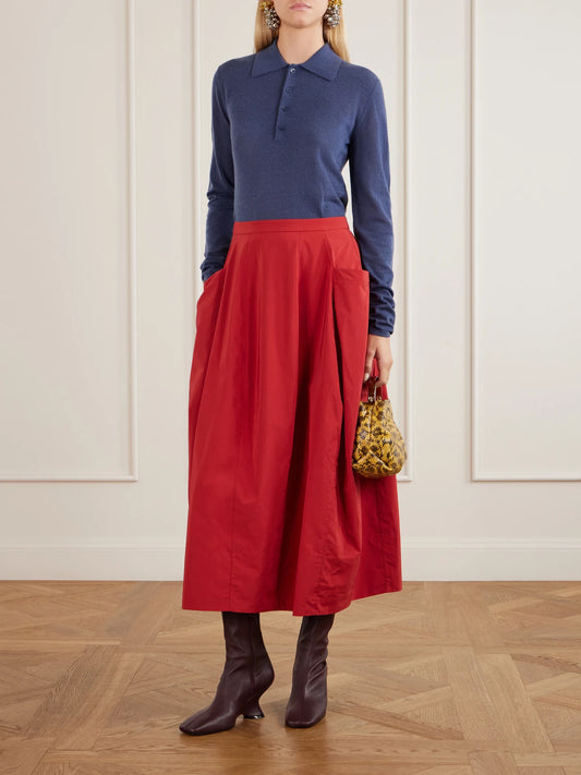 Image of a model wearing Outerwear. Product name - Wool-blend Knit Polo Sweater in Blue, Cobalt blue colour by brand - Tibi