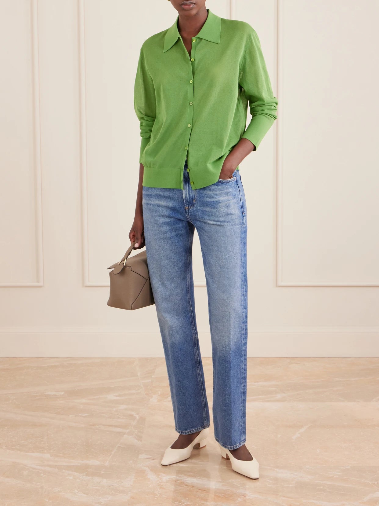 Image of a model wearing Outerwear. Product name - The Collared Cardi Cotton-blend Cardigan in Green colour by brand - FRAME