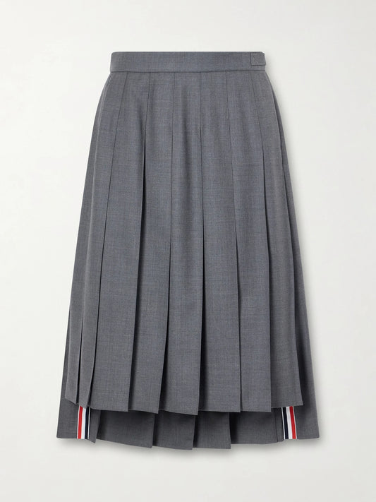 Image of a model wearing Skirts. Product name - Asymmetric Grosgrain-trimmed Pleated Wool Midi Skirt in Gray colour by brand - Thom Browne
