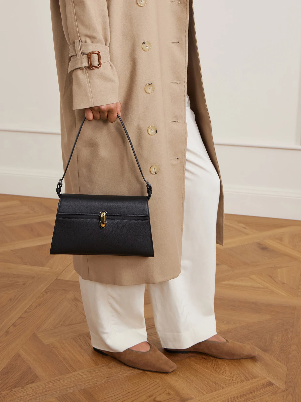 Image of Bags. Product name - Symmetry Textured-leather Shoulder Bag in Black colour by brand - Savette