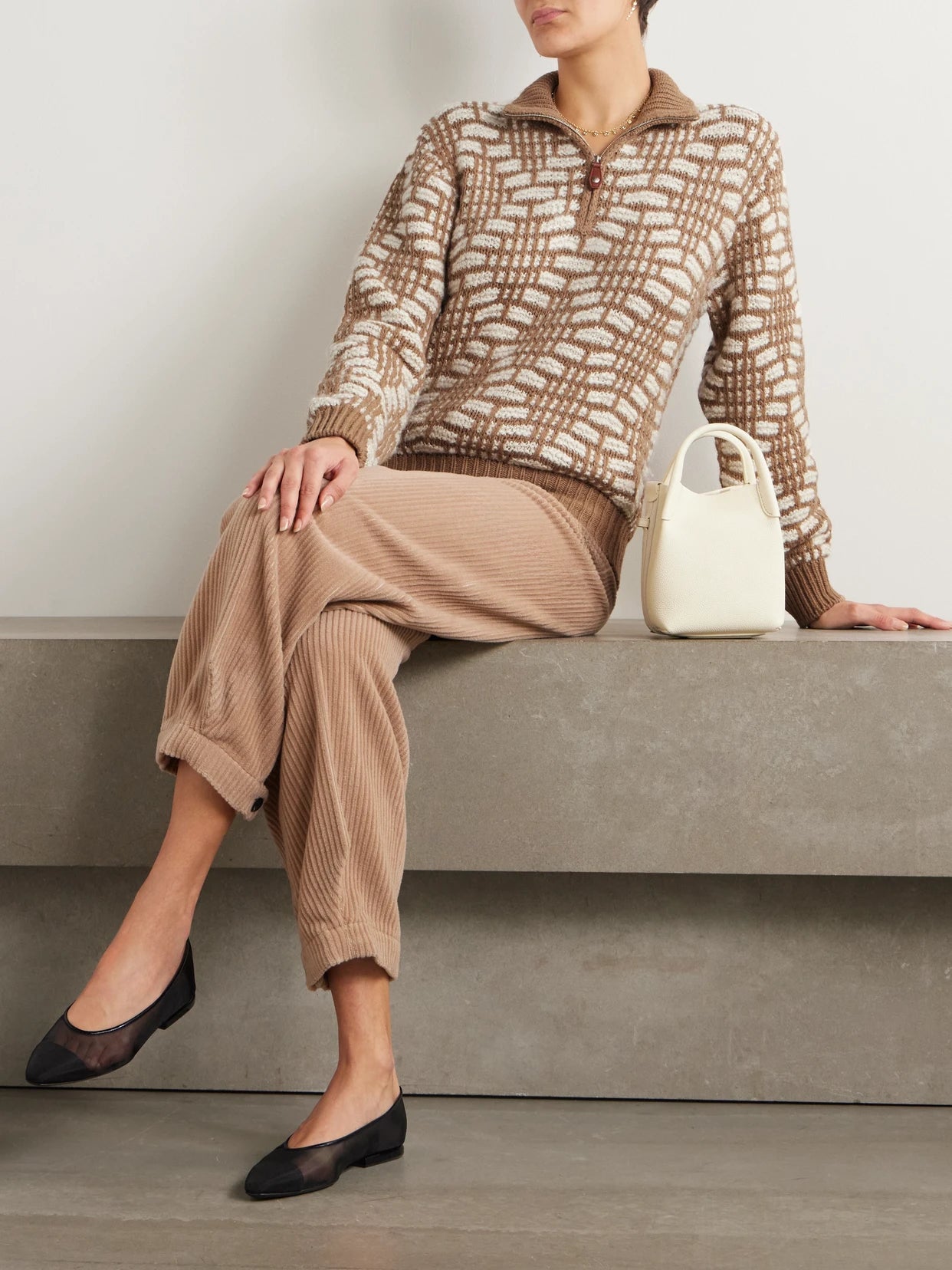 Image of a model wearing Outerwear. Product name - Jacquard-knit Camel Hair Sweater in Beige colour by brand - Loro Piana
