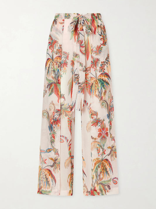 Image of a model wearing Pants. Product name - Belted Tiered Paisley And Floral-print Satin Wide-leg Pants in Pink colour by brand - Etro