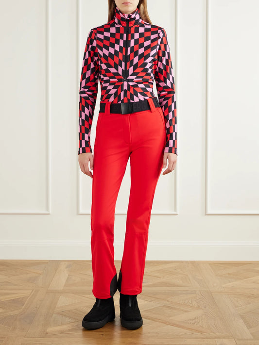 Image of a model wearing Tops. Product name - Chesu Printed Stretch-jersey Ski Top in Pink colour by brand - Goldbergh
