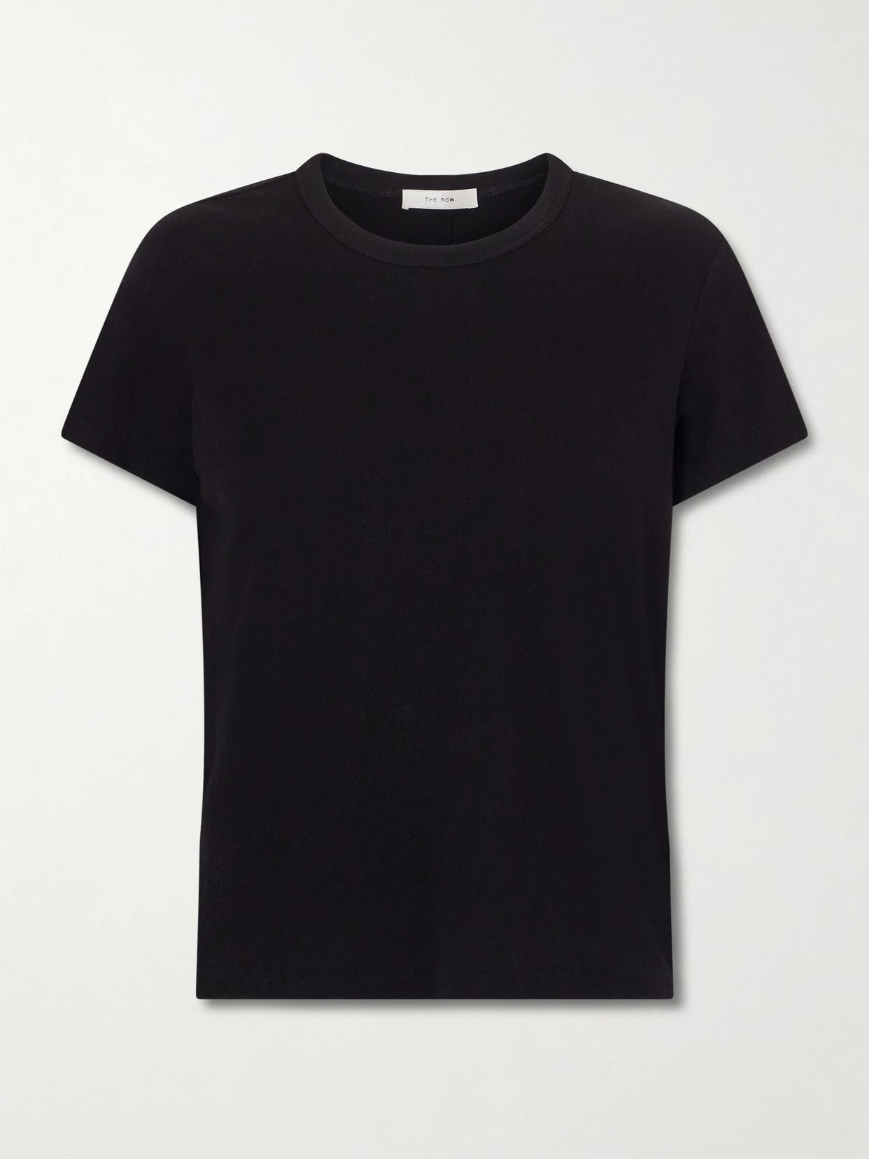 Image of a model wearing Tops. Product name - Jovita Cotton, Cashmere And Silk-blend Jersey T-shirt in Black colour by brand - The Row