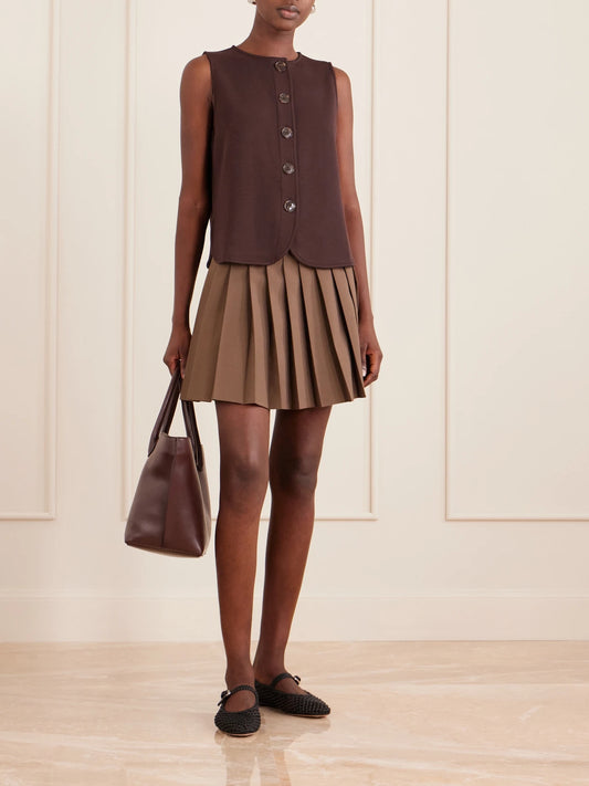 Image of a model wearing Tops. Product name - Josie Jersey Vest in Brown colour by brand - Varley