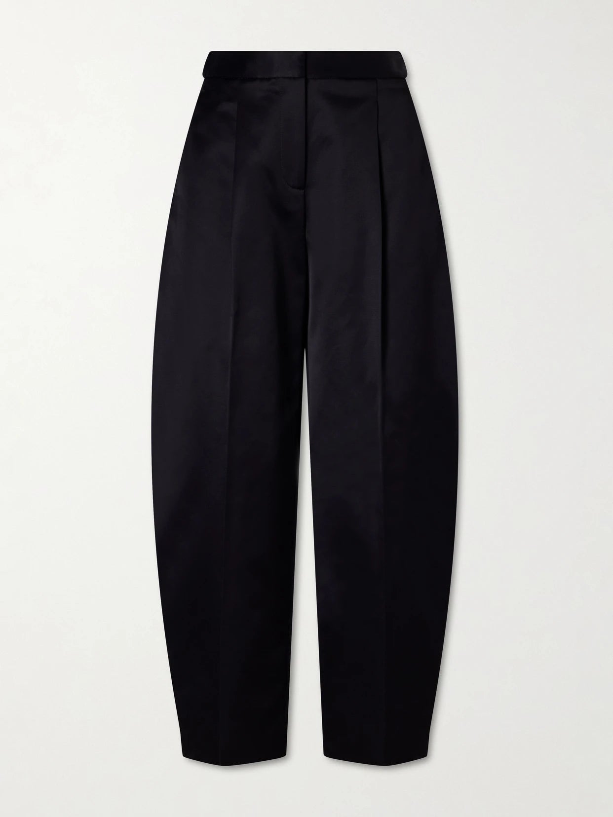Image of a model wearing Pants. Product name - Pleated Cotton-blend Tapered Pants in Black colour by brand - Alaïa