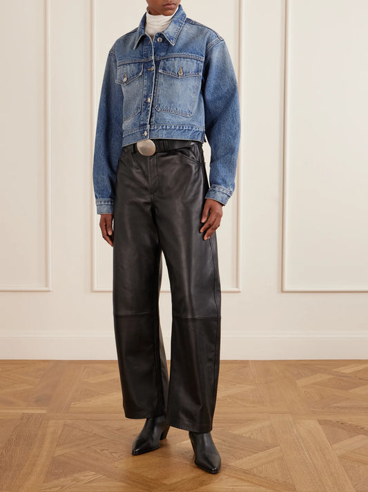 Image of a model wearing Pants. Product name - Tribeca Leather Wide-leg Pants in Black colour by brand - Nili Lotan