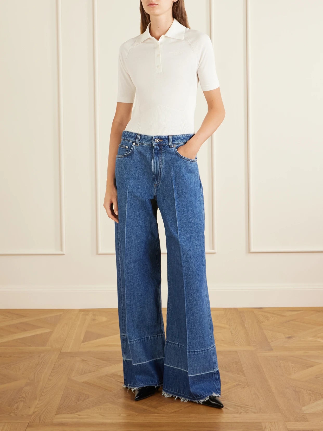 Image of a model wearing Outerwear. Product name - Cropped Cotton-blend Polo Shirt in Ivory colour by brand - Givenchy