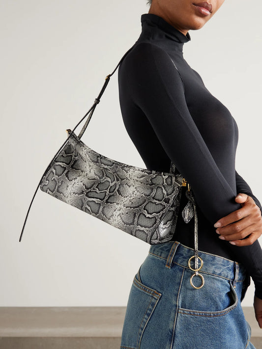 Image of Bags. Product name - Le Click E/w Medium Snake-effect Eel Shoulder Bag in Snake print colour by brand - Alaïa