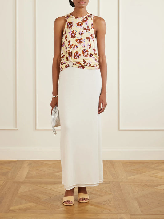 Image of a model wearing Tops. Product name - Gathered Floral-print Jersey Top in Yellow colour by brand - RABANNE
