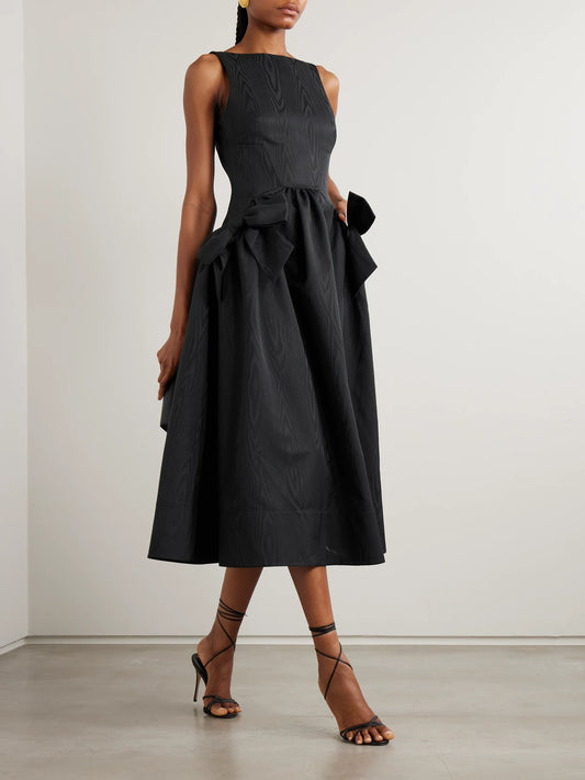 Image of Dresses. Product name - Narcissa Bow-embellished Gathered Moire Midi Dress in Black colour by brand - Rebecca Vallance
