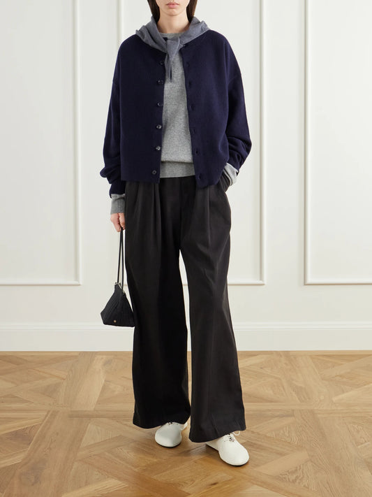 Image of a model wearing Outerwear. Product name - Cashmere-blend Cardigan in Navy colour by brand - Extreme Cashmere