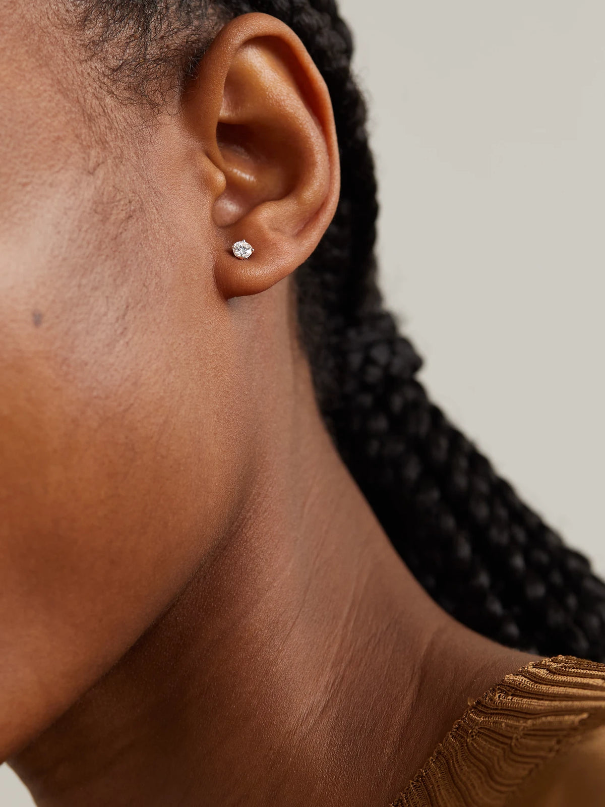 Image of Earrings. Product name - Db Classic Platinum Diamond Earrings in Gold colour by brand - De Beers London
