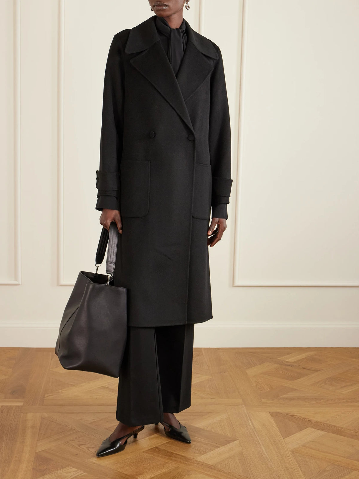 Image of Bags. Product name - Twist 26 Large Leather Tote in Black colour by brand - Métier