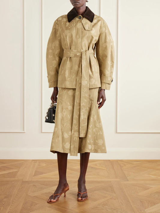 Image of a model wearing Skirts. Product name - Floral-jacquard Cotton Midi Skirt in Camel colour by brand - Erdem