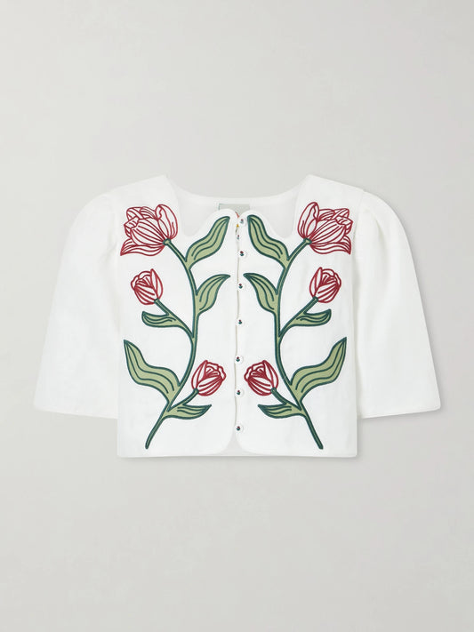Image of a model wearing Tops. Product name - Floral-embroidered Cropped Linen Top in Off-white colour by brand - Farm Rio