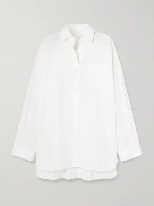 Image of a model wearing Tops. Product name - + Maria Mcmanus Oversized Organic Cotton-poplin Shirt in White colour by brand - AGOLDE