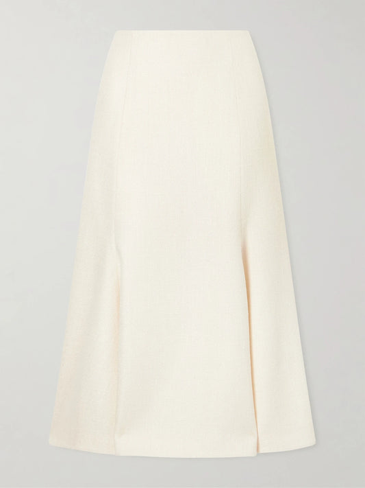 Image of a model wearing Skirts. Product name - Patterson Frayed Wool And Cashmere-blend Midi Skirt in Ivory colour by brand - Gabriela Hearst