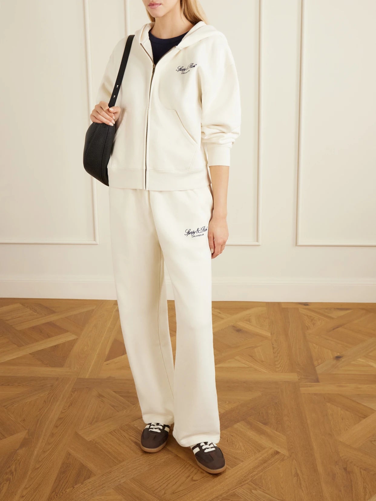 Image of Sleepwear & Loungewear. Product name - Vendome La Embroidered Cotton-fleece Track Pants in Ecru colour by brand - Sporty & Rich