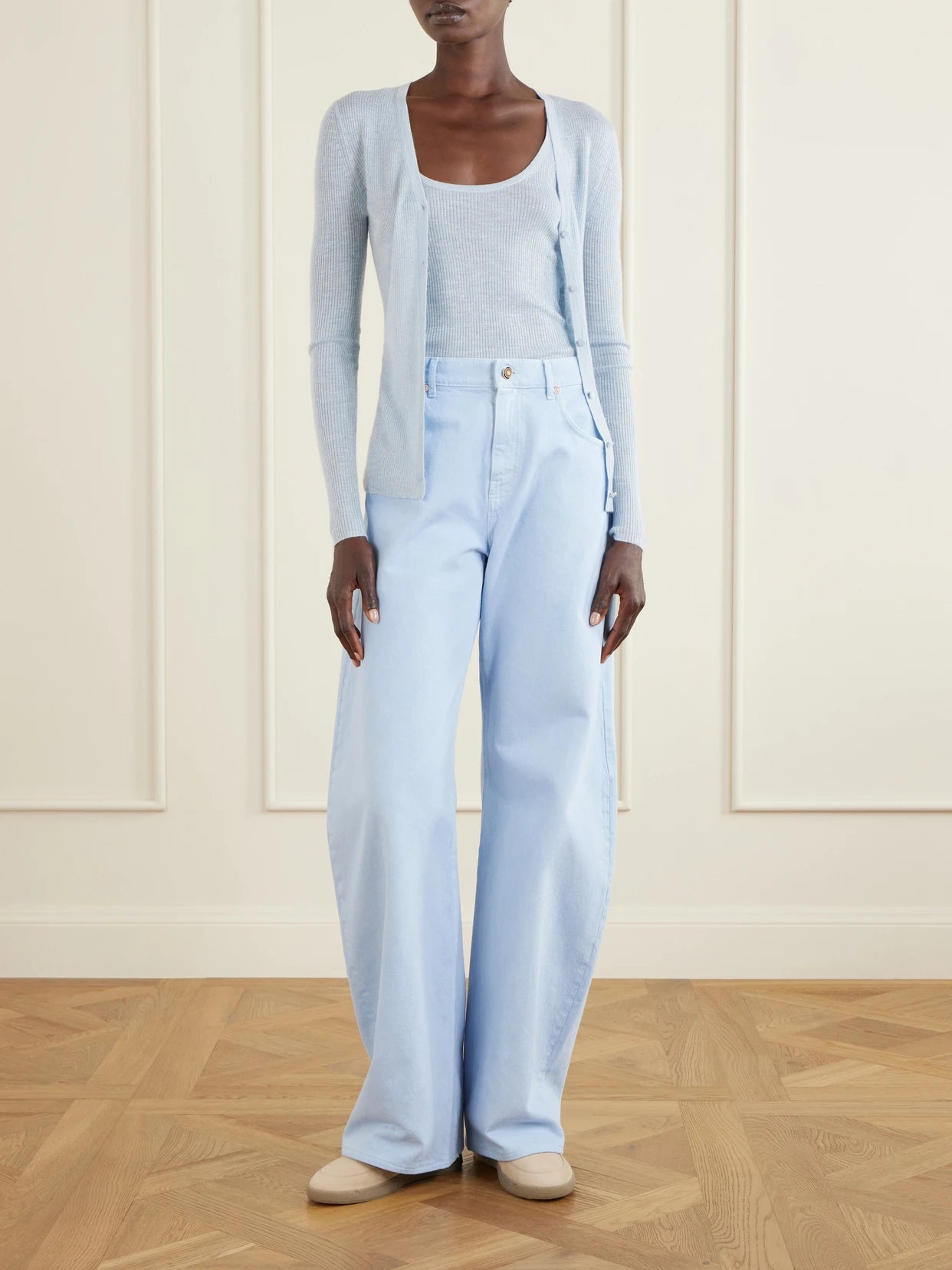 Image of a model wearing Outerwear. Product name - Aiste Ribbed Cashmere, Silk And Hemp-blend Cardigan in Sky blue colour by brand - Gabriela Hearst