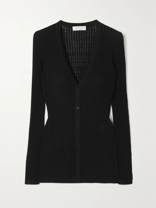 Image of a model wearing Outerwear. Product name - Emma Pointelle-knit Cashmere And Silk-blend Cardigan in Black colour by brand - Gabriela Hearst