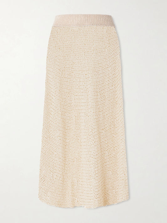 Image of a model wearing Skirts. Product name - Inaya Crocheted Cotton And Silk-blend Midi Skirt in Ivory colour by brand - KHAITE