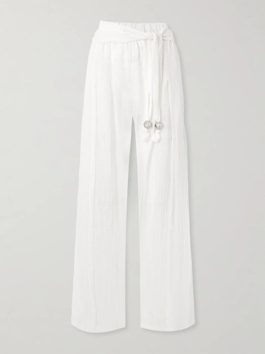 Image of Swimwear. Product name - Embellished Belted Crinkled Linen-blend Gauze Wide-leg Pants in White colour by brand - Lisa Marie Fernandez
