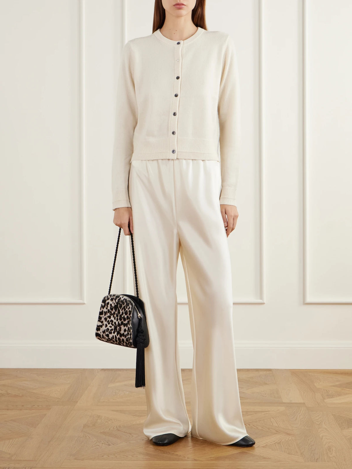 Image of a model wearing Outerwear. Product name - Cropped Cashmere And Cotton-blend Cardigan in Ivory colour by brand - Maria McManus