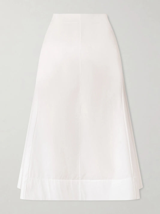 Image of a model wearing Skirts. Product name - Artin Paneled Cotton-poplin Midi Skirt in White colour by brand - KHAITE