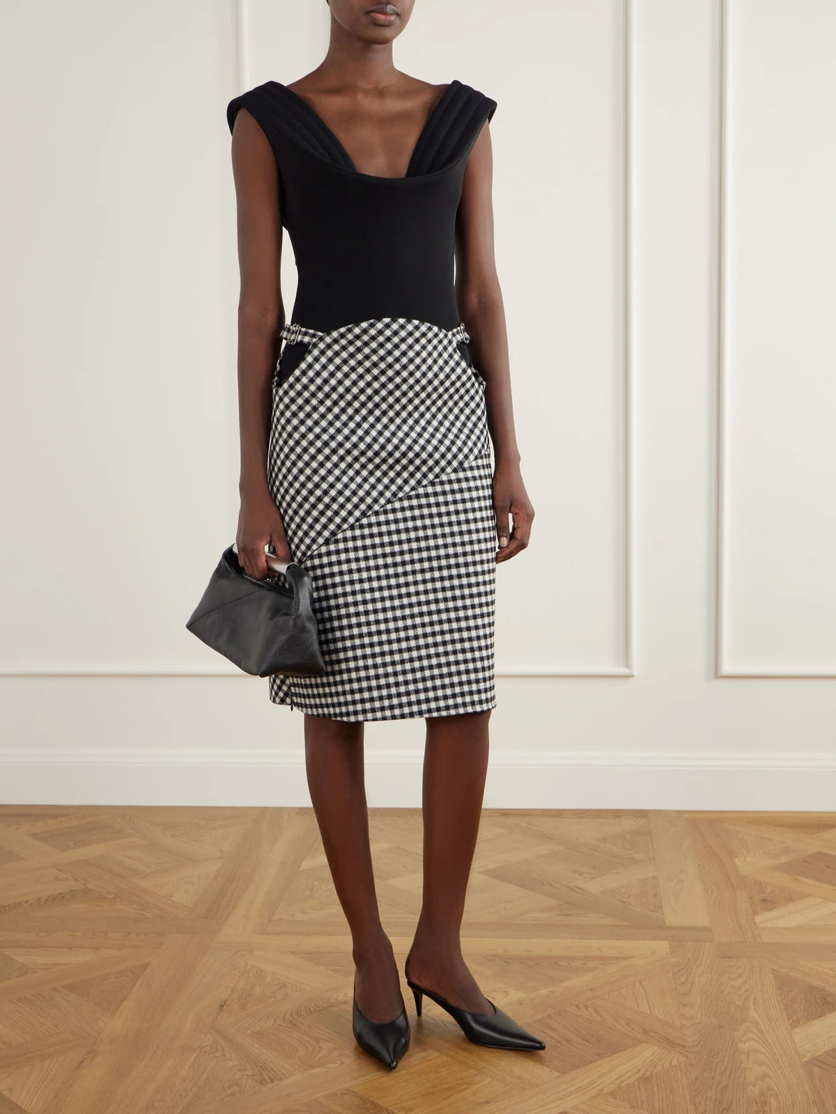 Image of a model wearing Skirts. Product name - Checked Wool-blend Midi Skirt in Multi colour by brand - Jean Paul Gaultier