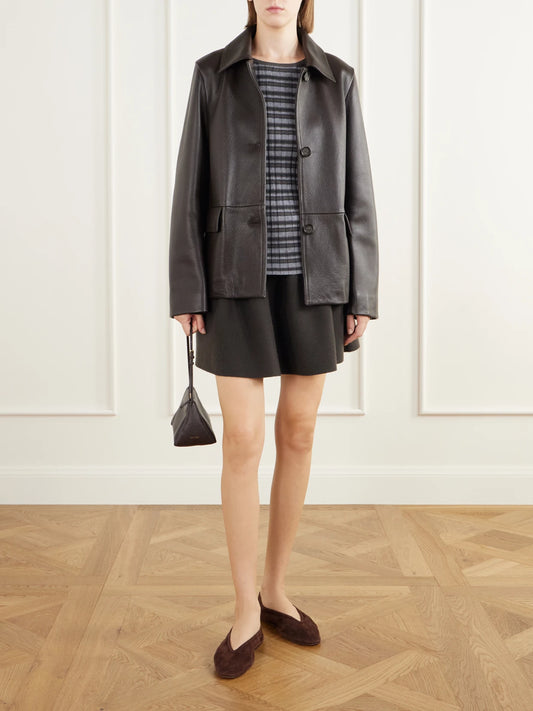 Image of a model wearing Outerwear. Product name - Tarika Striped Ribbed Cotton And Cashmere-blend Sweater in Charcoal colour by brand - LISA YANG