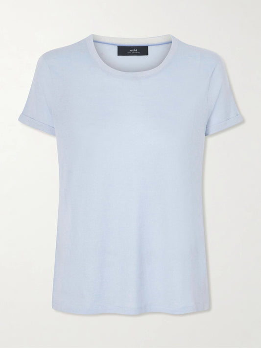 Image of a model wearing Outerwear. Product name - Cashmere T-shirt in Sky blue colour by brand - Arch4