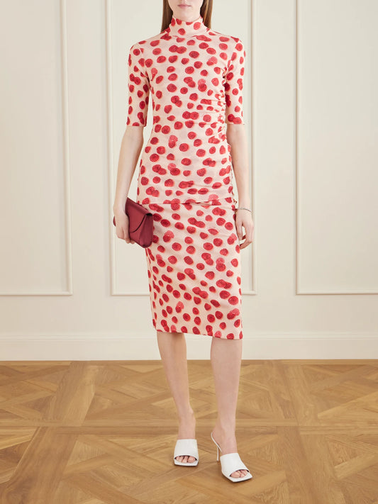 Image of a model wearing Skirts. Product name - Printed Mesh Midi Skirt in Coral colour by brand - Stella McCartney