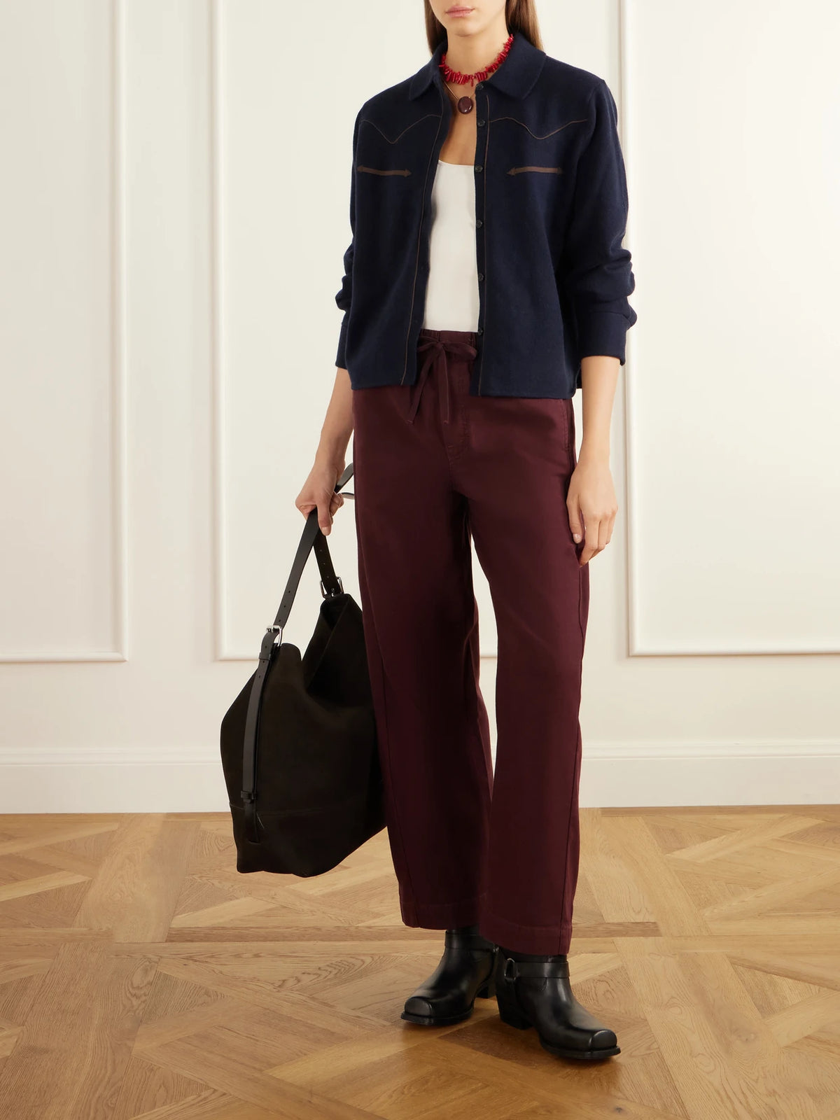 Image of a model wearing Pants. Product name - The Drawn Full Pipe Flood Cotton-twill Wide-leg Pants in Burgundy colour by brand - Mother