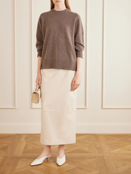 Image of a model wearing Outerwear. Product name - Baltra Cashmere Sweater in Brown colour by brand - Loulou de Saison