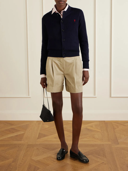 Image of a model wearing Outerwear. Product name - Embroidered Wool Cardigan in Navy colour by brand - AMI PARIS