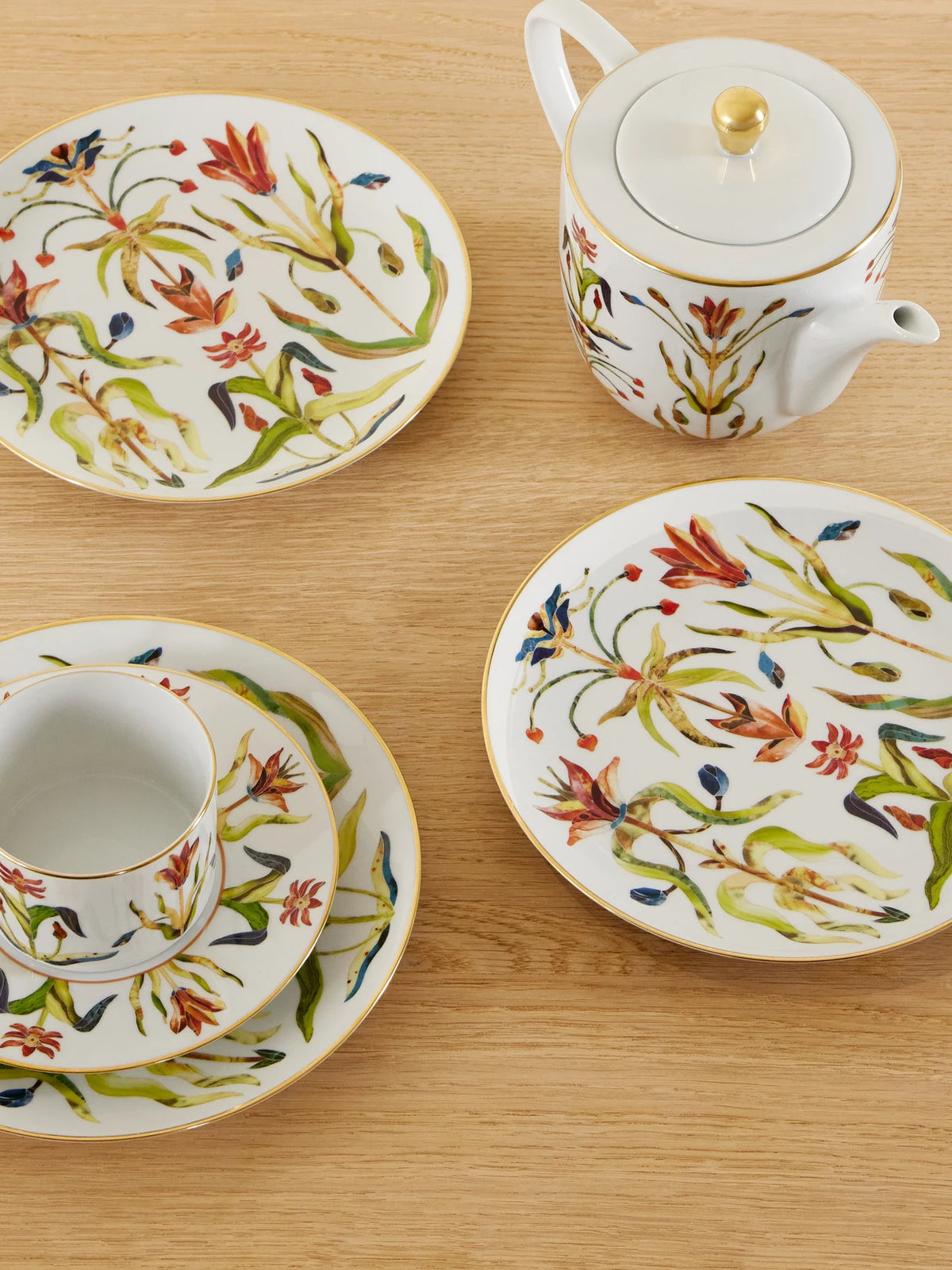 Image of Tableware. Product name - Grand Tour Set Of Four Gold-plated Porcelain Dessert Plates in White colour by brand - L'Objet