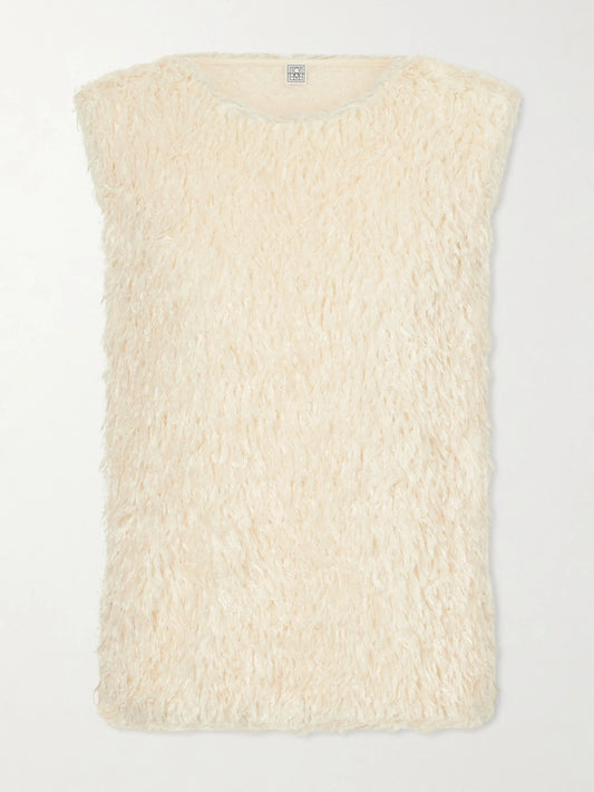 Image of a model wearing Tops. Product name - Fleece Top in Off-white colour by brand - TOTEME