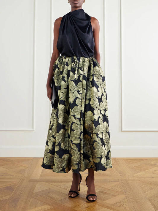 Image of a model wearing Skirts. Product name - Elodie Gathered Floral-brocade Maxi Skirt in Green colour by brand - Abadia