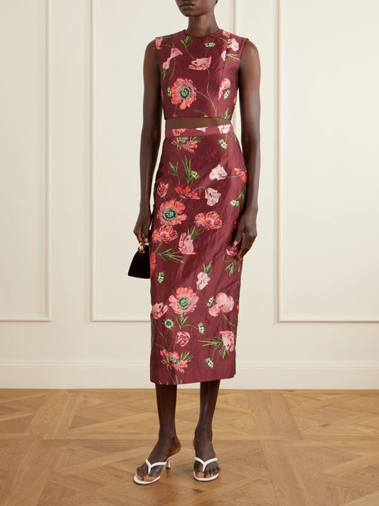 Image of a model wearing Skirts. Product name - Floral-printed Satin Midi Pencil Skirt in Burgundy colour by brand - Erdem