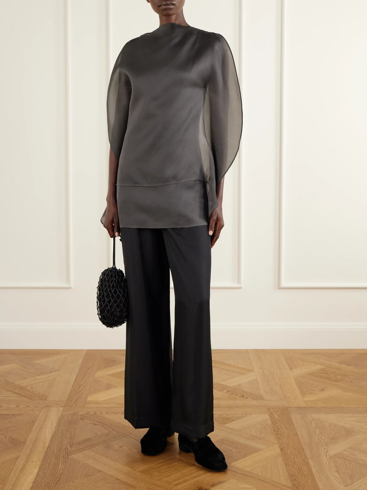 Image of a model wearing Tops. Product name - Ikra Silk-organza Blouse in Dark gray colour by brand - Ruohan