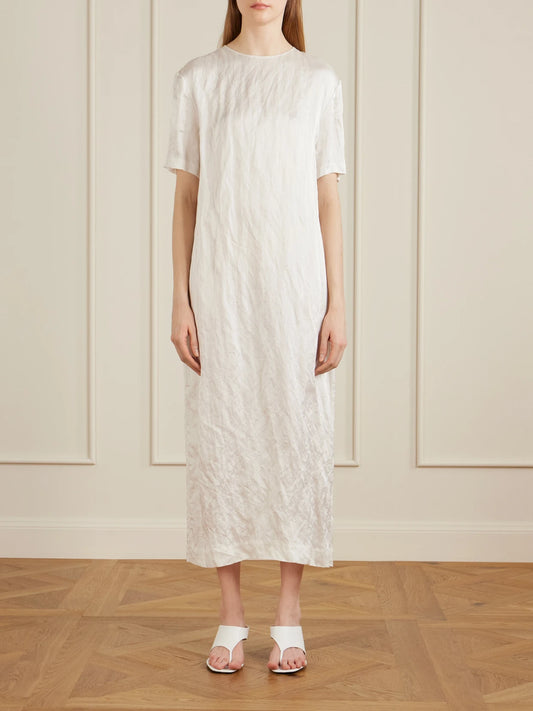 Image of Heels. Product name - Marlow Leather Wedge Mules in White colour by brand - KHAITE