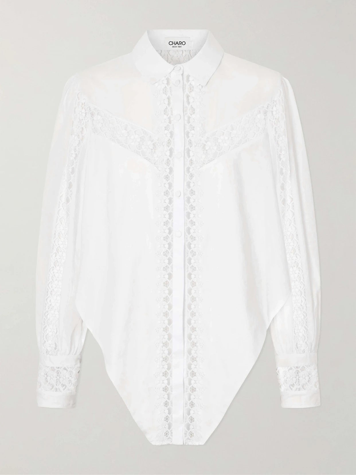 Image of a model wearing Tops. Product name - Devi Cotton-blend Shirt in White colour by brand - Charo Ruiz